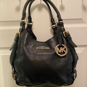 Used Michael Kors black leather purse